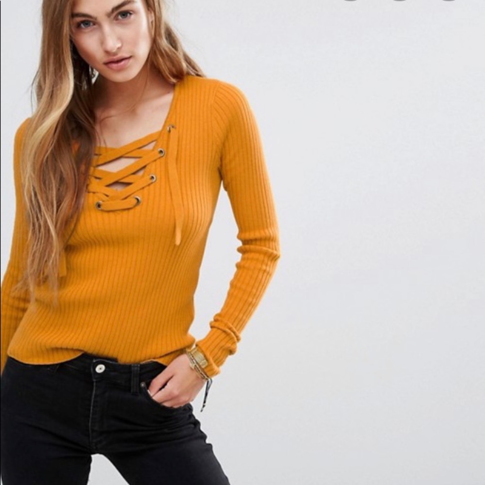 Hollister lace up sweater in a mustard color